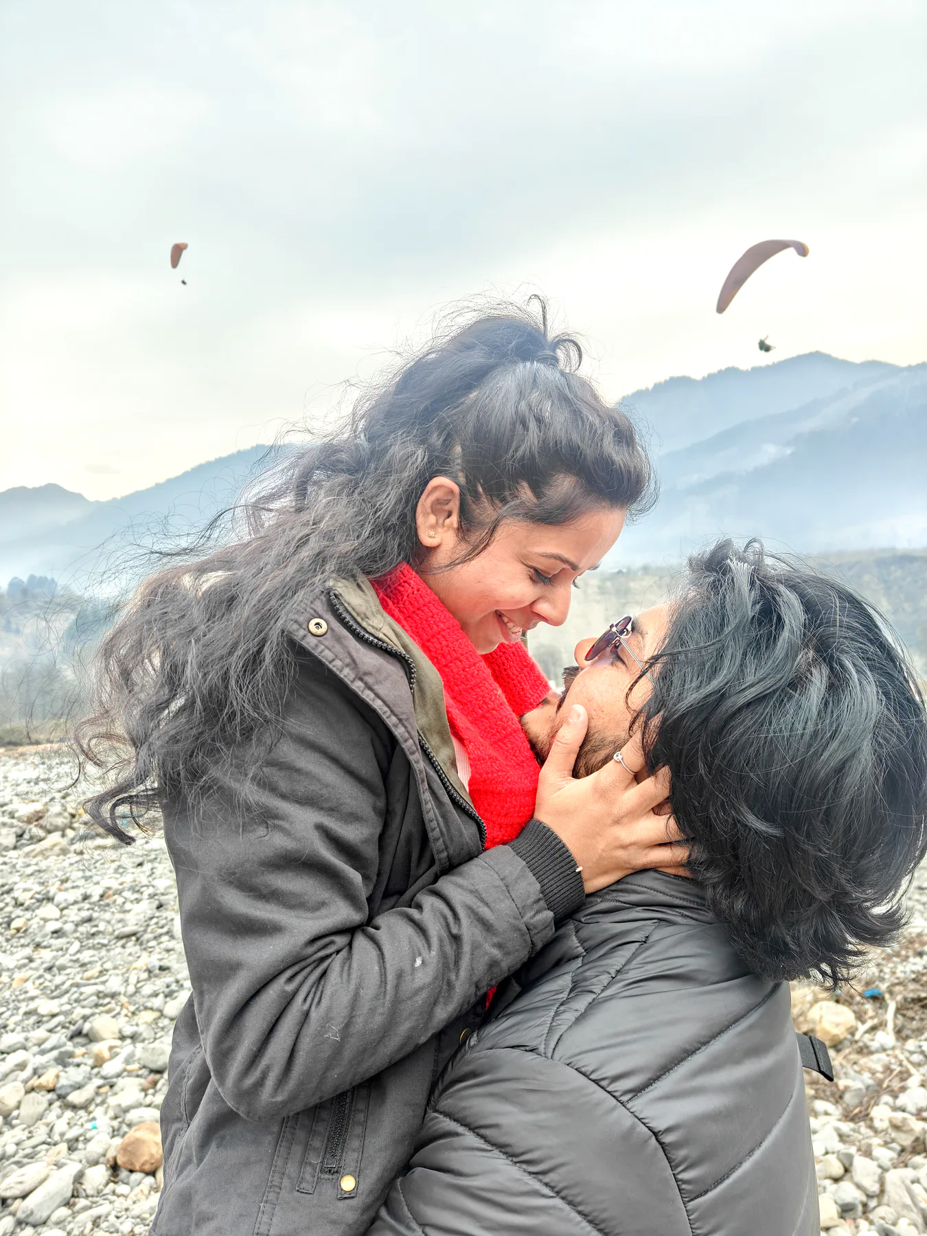Pooja and Yuvaraj sharing a candid mountain moment