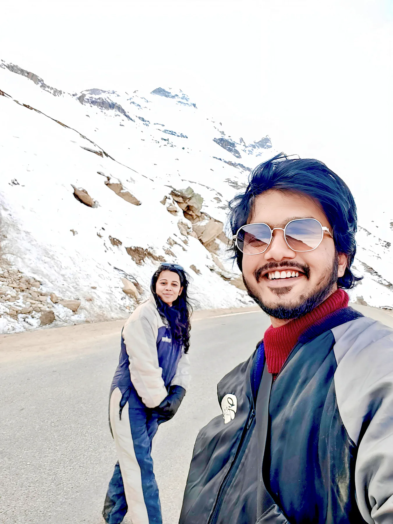 Pooja and Yuvaraj taking a selfie in the snow